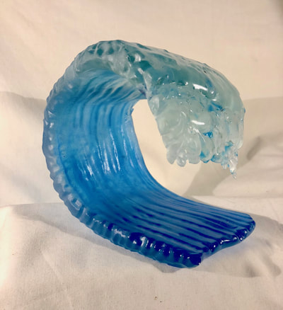 awesome pitching glass wave sculpture