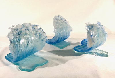 small foamy glass wave sculpture